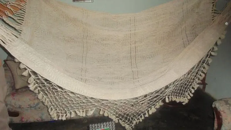 Chinchorro de curagua tejido a mano con randas de macramé
