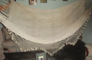 Chinchorro de curagua tejido a mano con randas de macramé